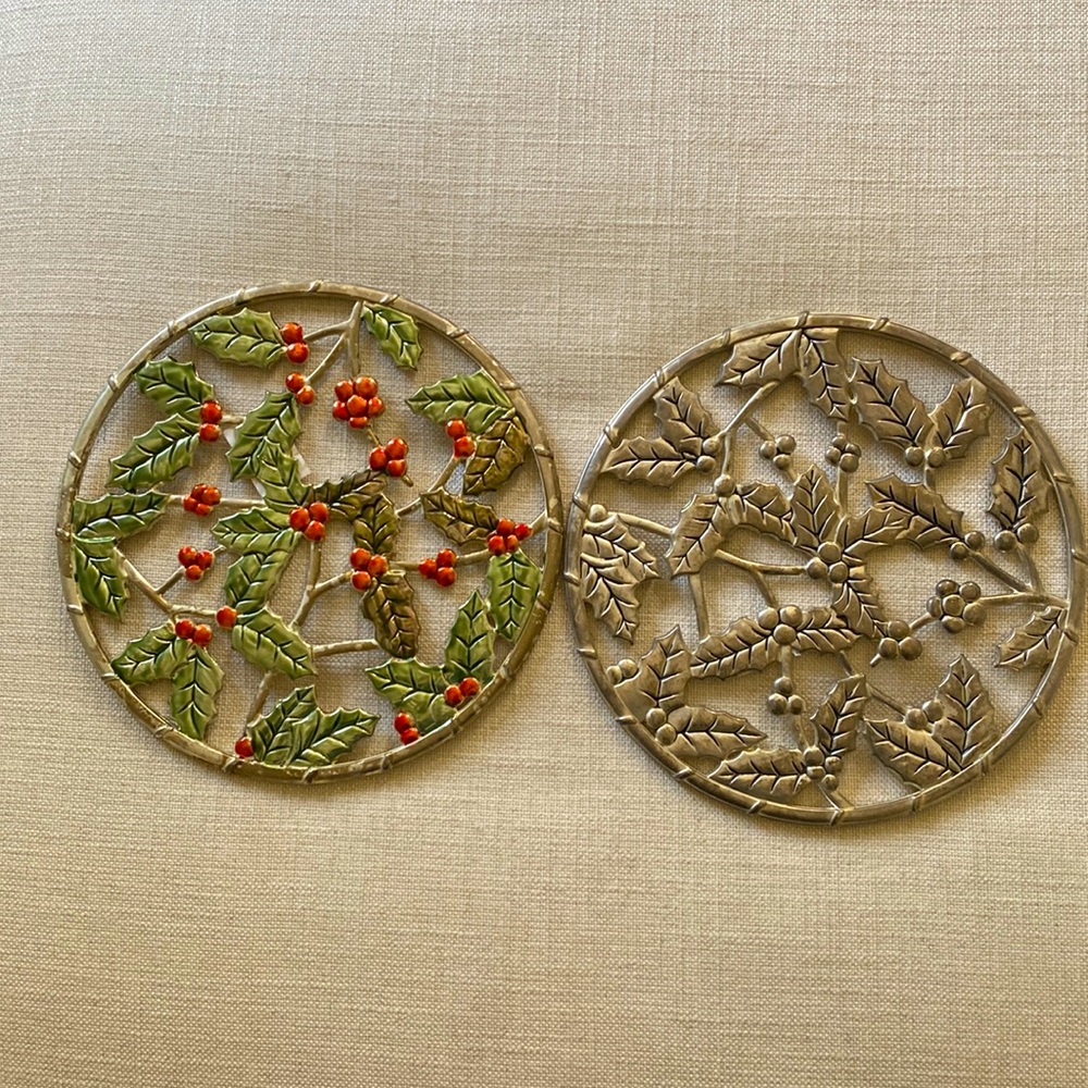 Pair of holly motif trivets